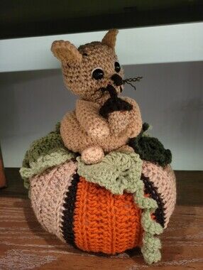 Fall Pumpkin With Squirrel Nested Upon Leaves And His Nut Thanksgiving Decor